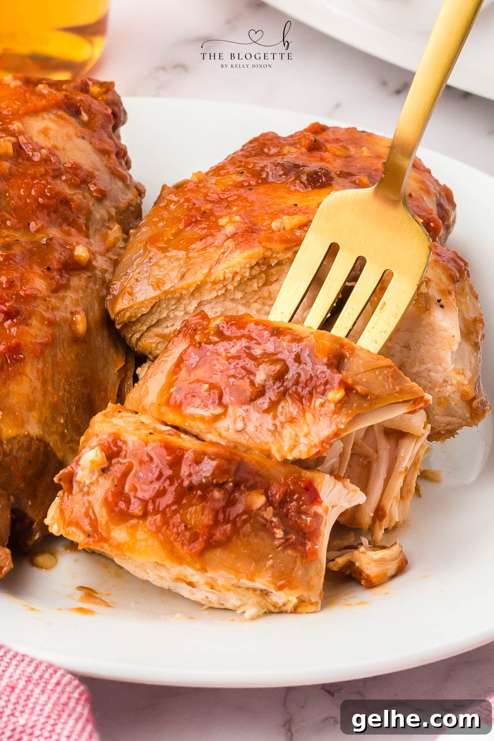 Crock Pot Fireball Chicken - a flavorful slow cooker chicken seasoned with a homemade Fireball-flavored sauce! The whiskey sauce makes the chicken so juicy and delicious.