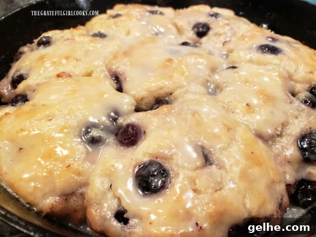 After the icing firms up, the vanilla glazed blueberry biscuits are ready to eat.