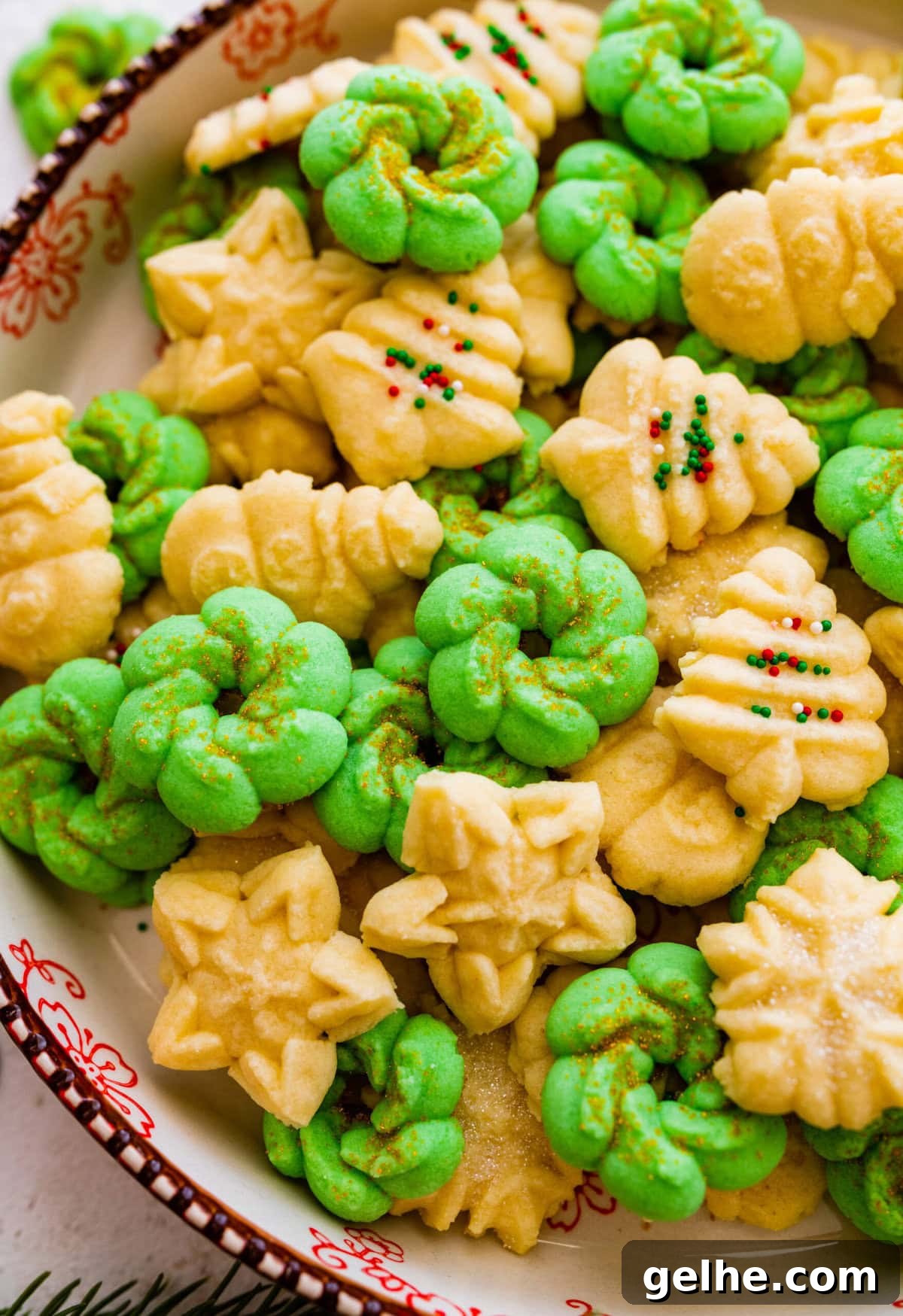 All the decorated spritz cookies on a beautiful festive cookie platter ready to serve. 