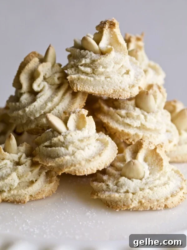 Soft Amaretti Cookies Italian Almond Cookies on a cake plate