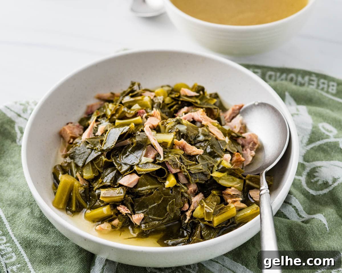 Southern collard greens with smoked turkey in a serving bowl.