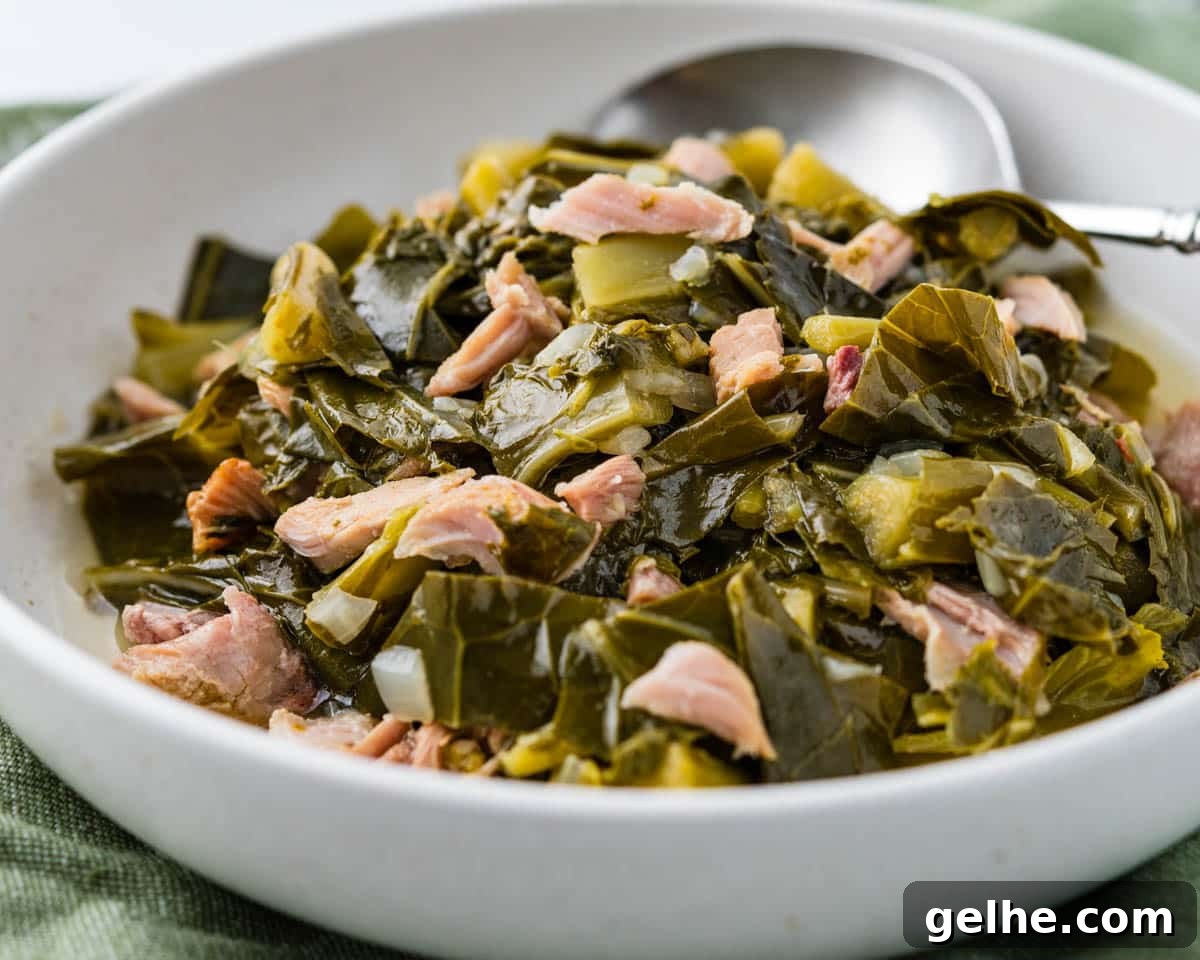 Southern collard greens with smoked turkey in a serving dish.