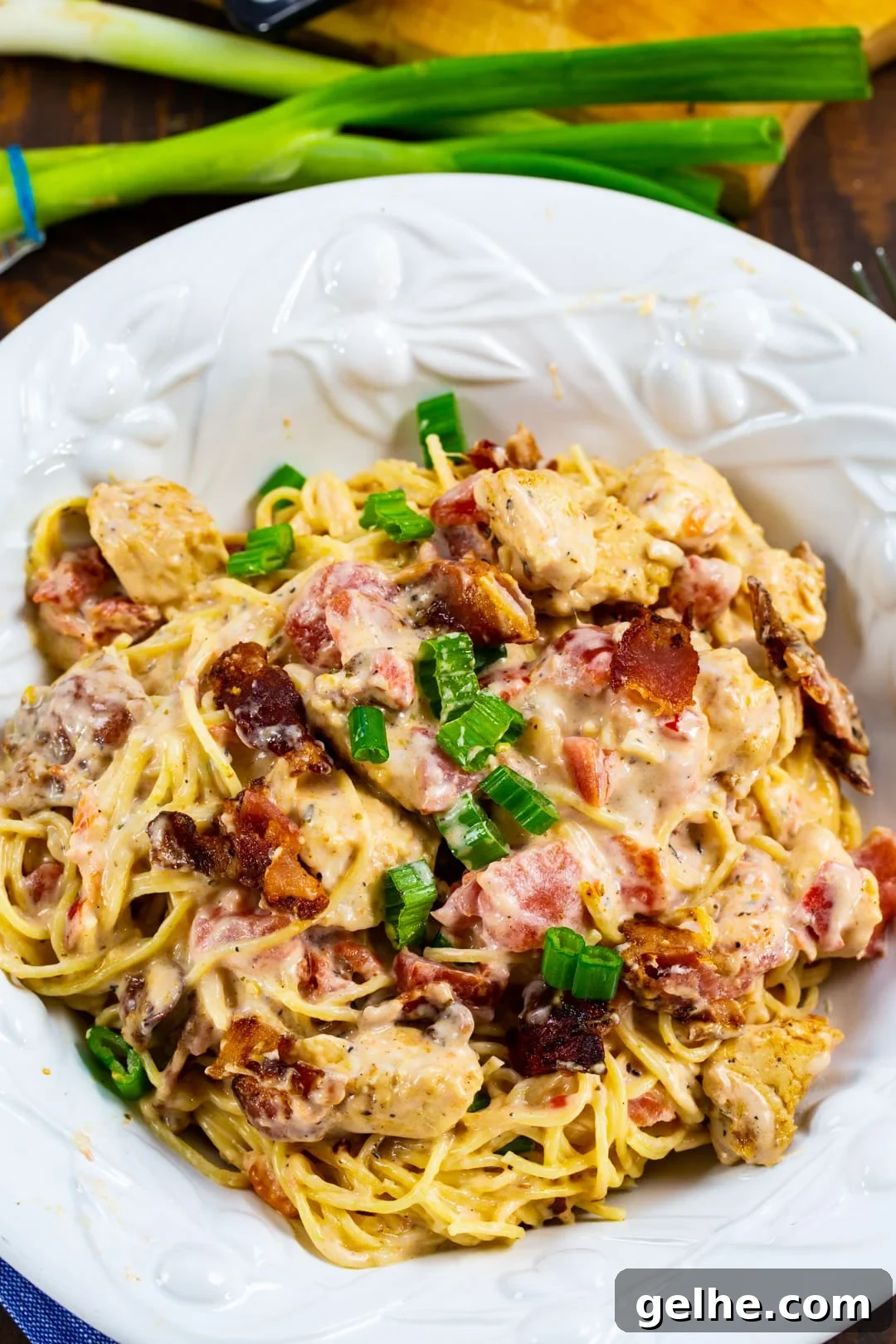 Angel Hair Pasta with Chicken in a serving bowl.