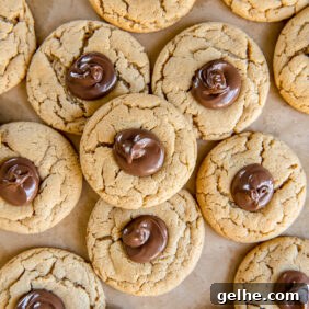 peanut butter nutella cookies on parchment paper.
