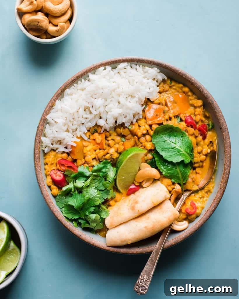 butternut squash lentil curry with Indian spices, cilantro, lime, and rice