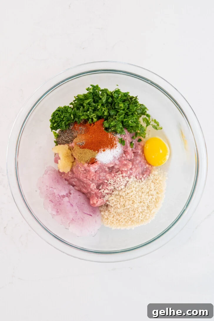A bowl with ground lamb, egg, and more.