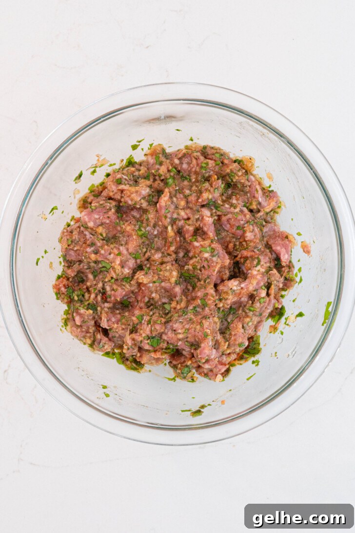 A bowl of ground lamb meatball mix.