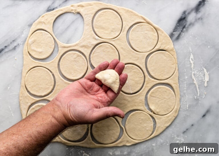 overhead: folding over dough for shish barak