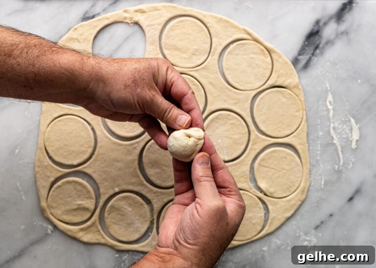 overhead: sealing meat dumpling before cooking
