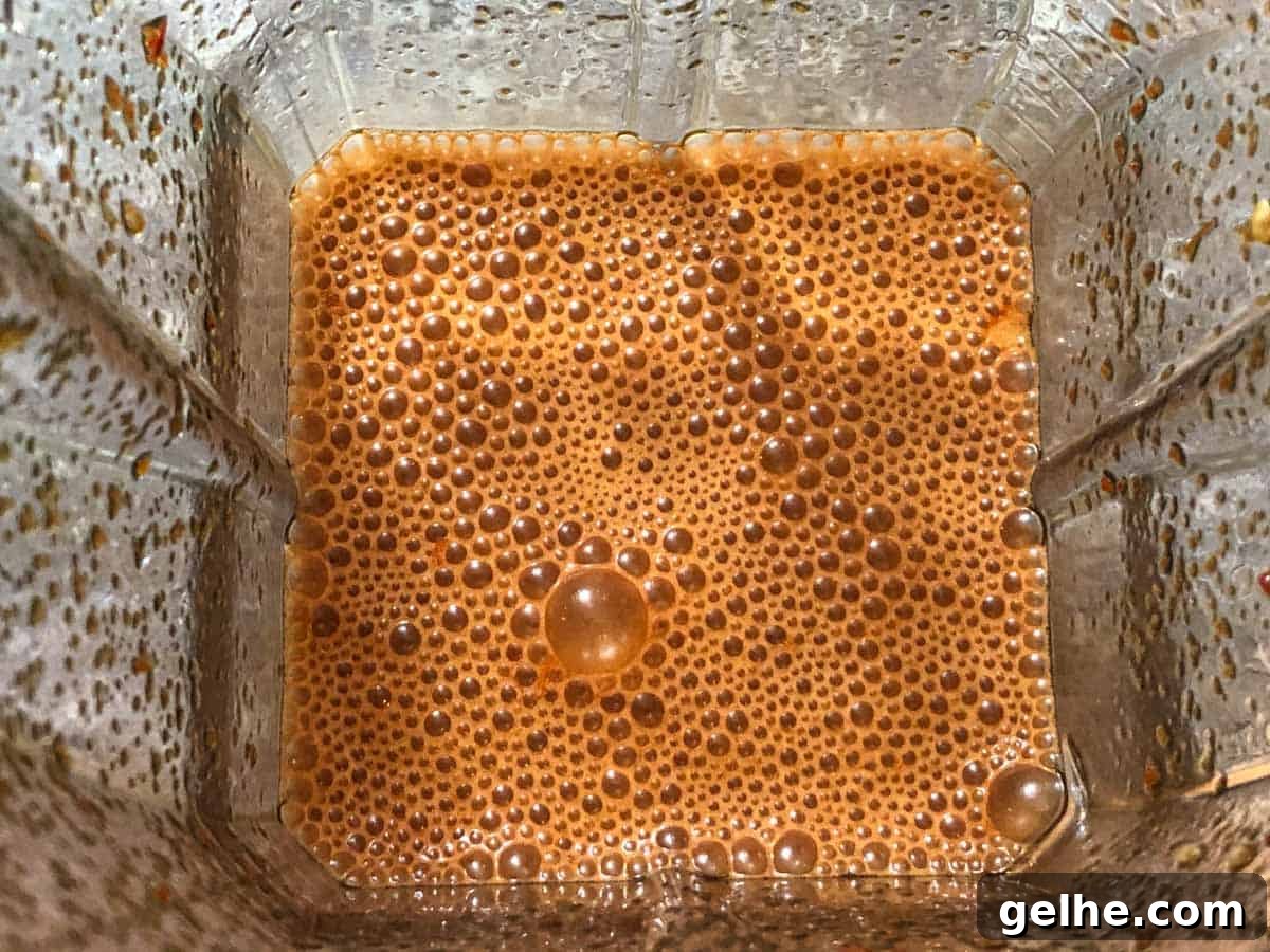 Venison jerky marinade blended in a blender with air bubbles