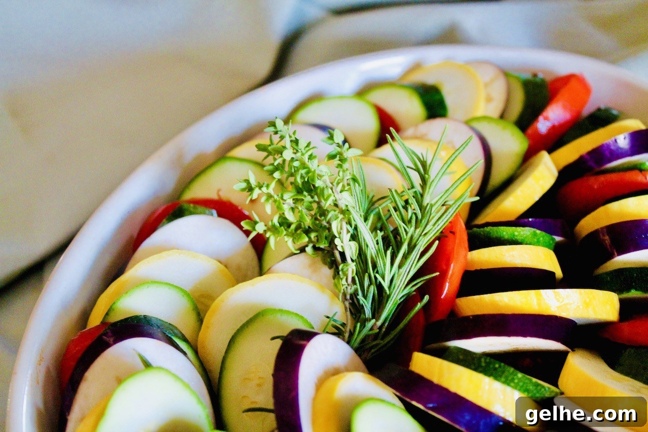 assemble by layering vegetables over the ground beef mixture