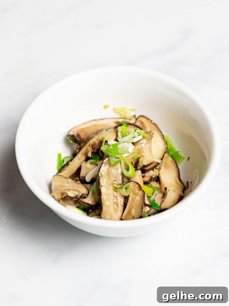 Korean mushroom side dish in a white bowl