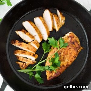 Perfectly Pan-Seared Chicken Breasts: Juicy, Crispy Results Every Time 9 Seared chicken in a skillet with parsley