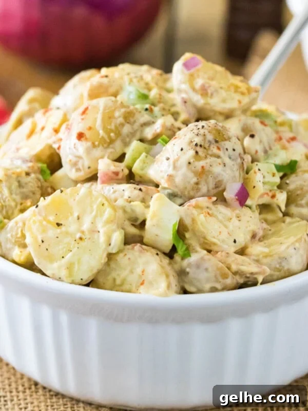 Large serving bowl of potato salad.