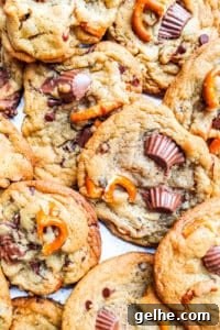 Peanut butter pretzel cookies stacked on top of each other.