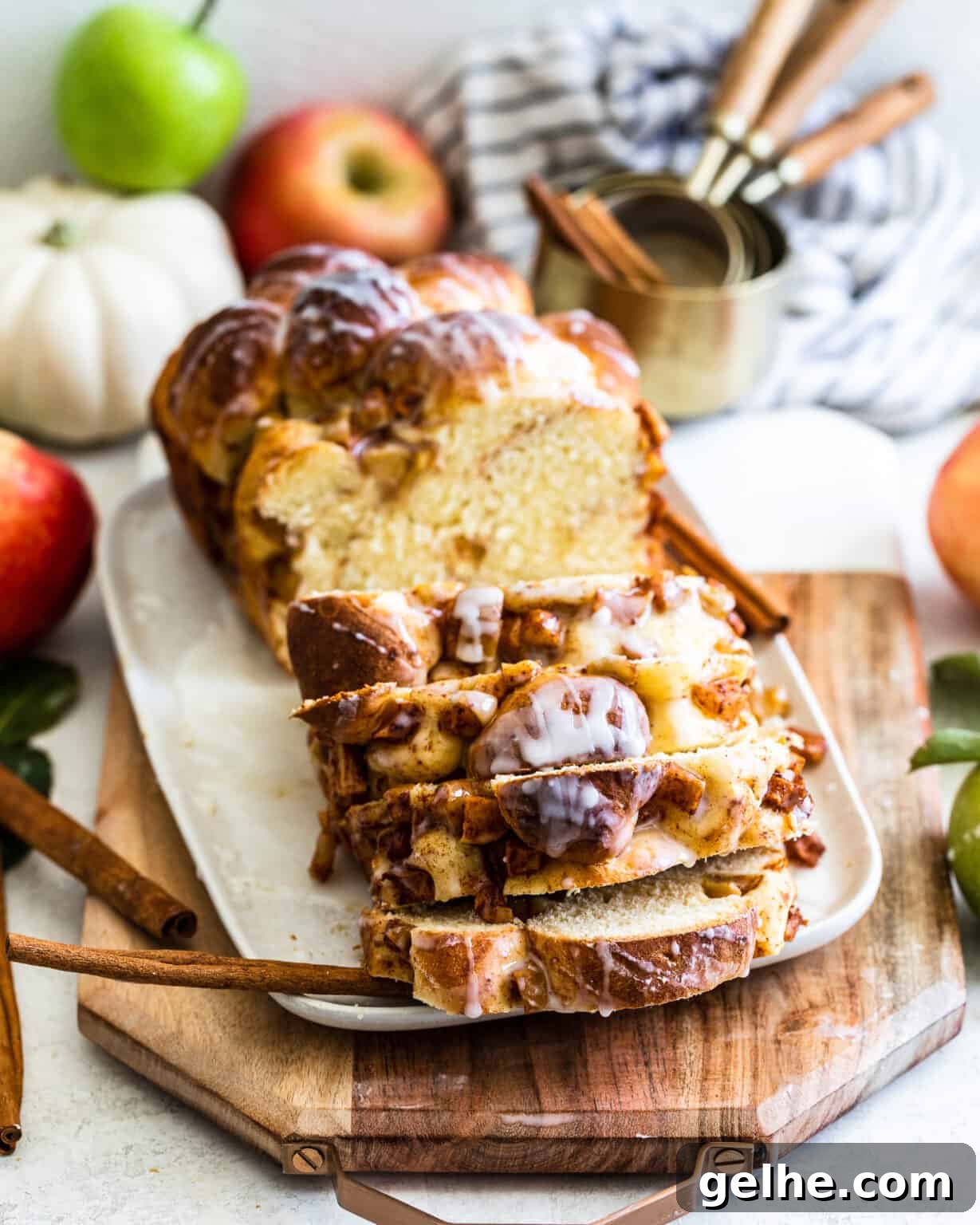 apple and pear bread sliced on a cutting board