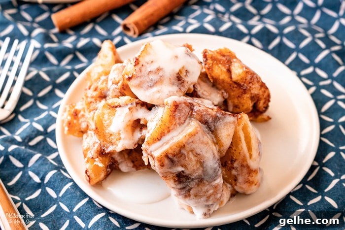 Cinnamon Roll Breakfast Casserole served on a white plate.