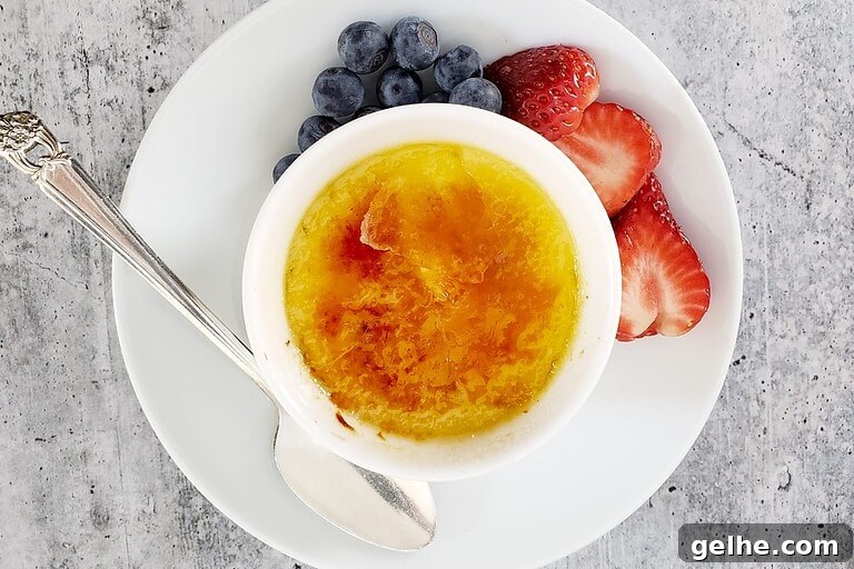 Crème Brûlée in the Instant Pot: Silky Custard with Caramelized Top 6 Custard topped with caramelized sugar and berries.
