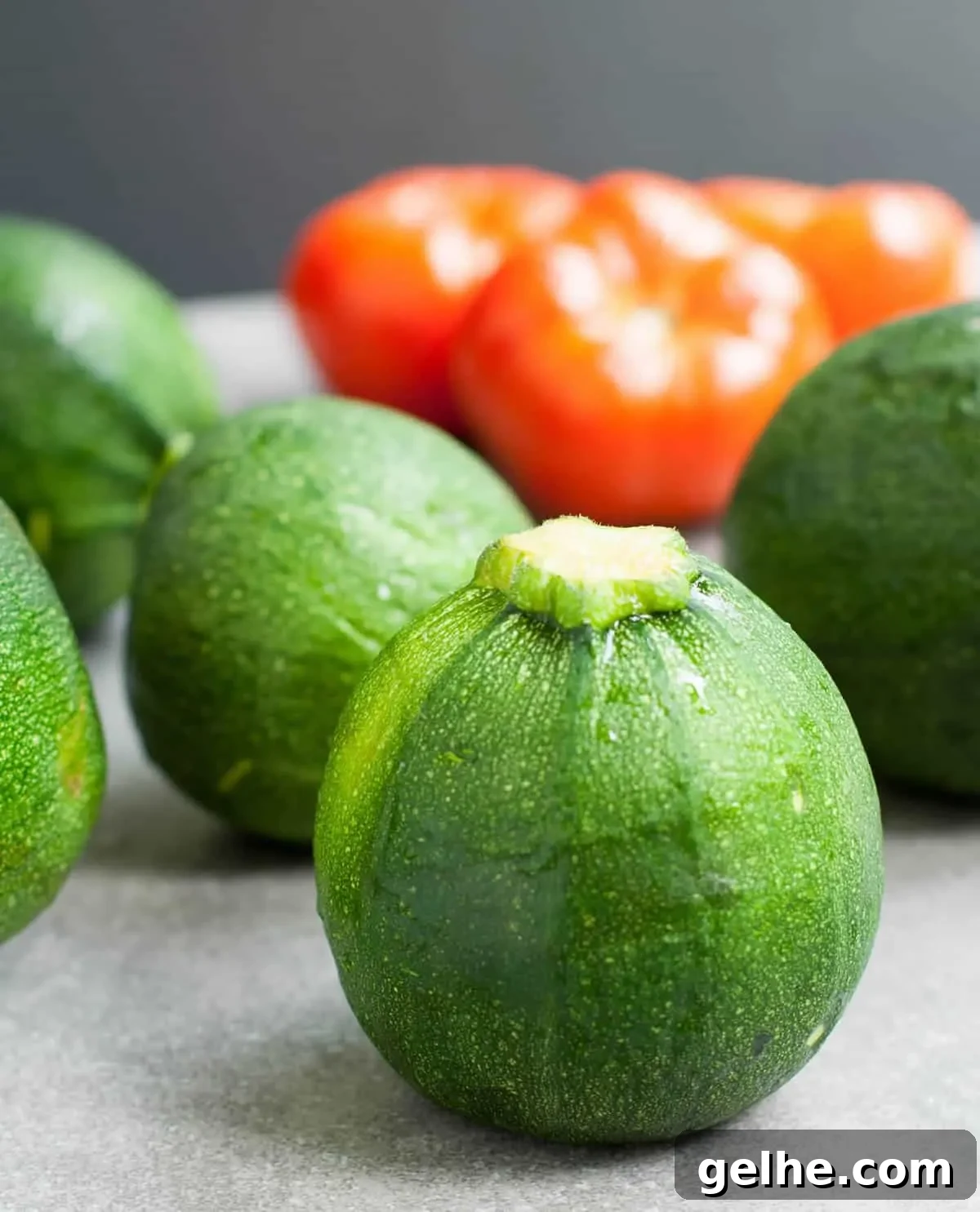 Grilled Zucchini Caprese Stacks. Thick, meaty slices of zucchini are grilled then stacked with hearty slices of tomato and fresh mozzarella. Filling enough for a main, delicious as a side or pop it onto a bun for a delicious veggie sandwich!