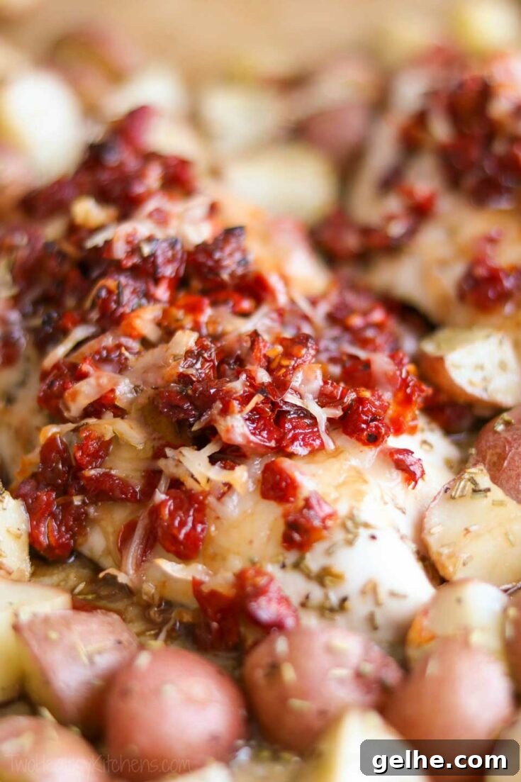 Sheet pan chicken and potatoes with rosemary and sun-dried tomatoes.