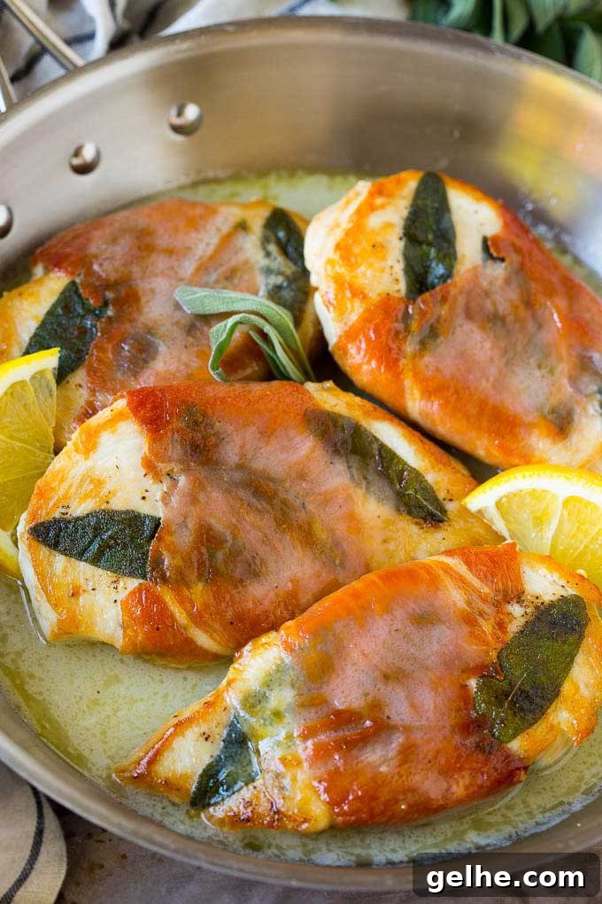 Chicken Saltimbocca in skillet with sage and lemon.