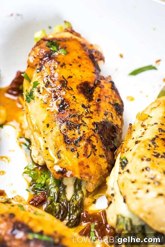 Asparagus stuffed chicken breasts closeup.