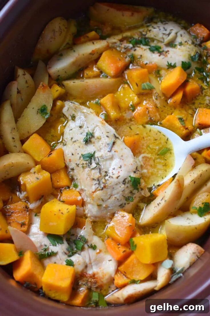 Crockpot apple chicken breast in slow cooker.