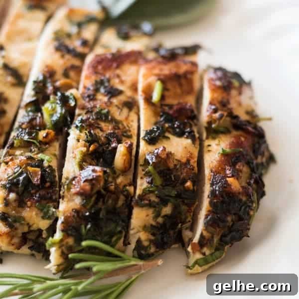 Macadamia nut crusted chicken sliced with rosemary.