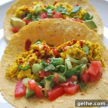 a plate with scrambled tofu tacos