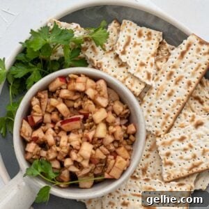 charoset in a bowl surrounded by pieces of matzo