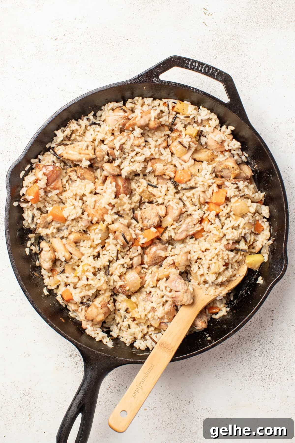 Dijon Chicken Skillet with Wild Rice and Creamy Mustard Sauce 8 Stirring the wild rice into the chicken and dijon sauce.