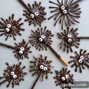 Chocolate pretzel firework treats with candy eyes and sprinkle decorations.