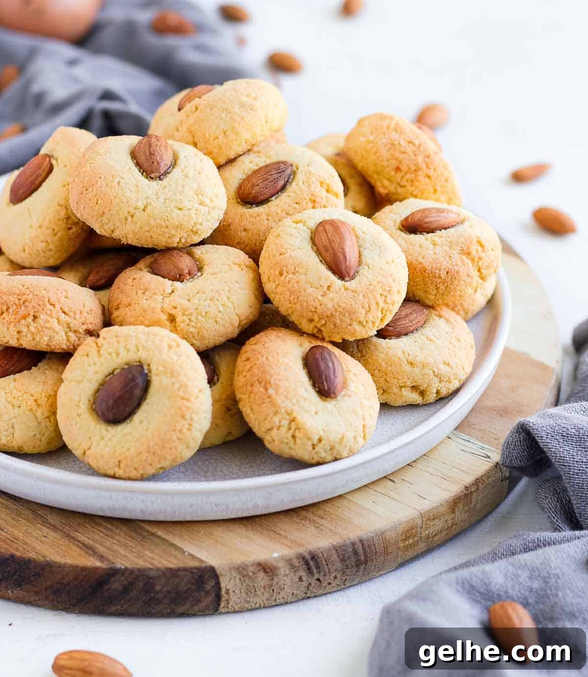 Cookies stacked on a white plate.