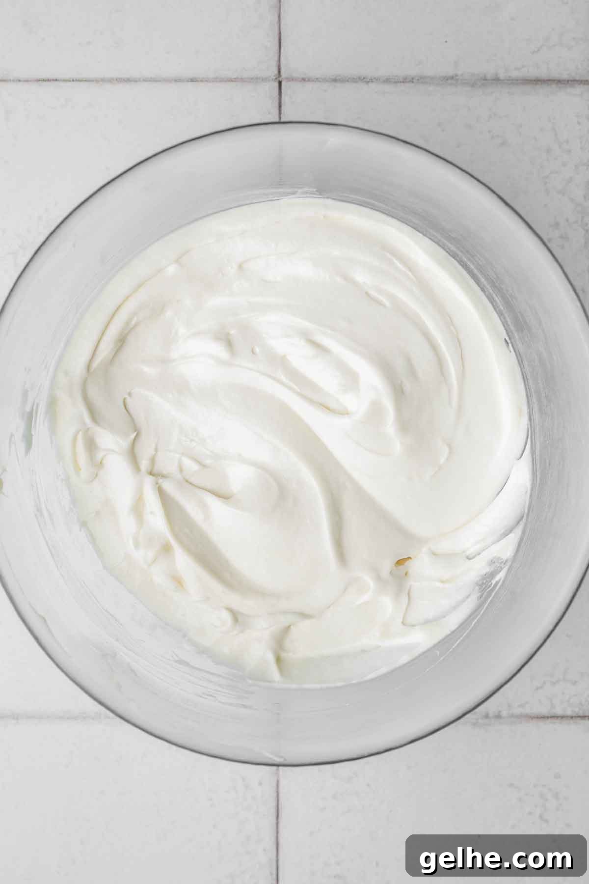 Frosted Gingerbread Cookies Recipe for Holiday Baking 12 medium bowl with cream cheese frosting mixture