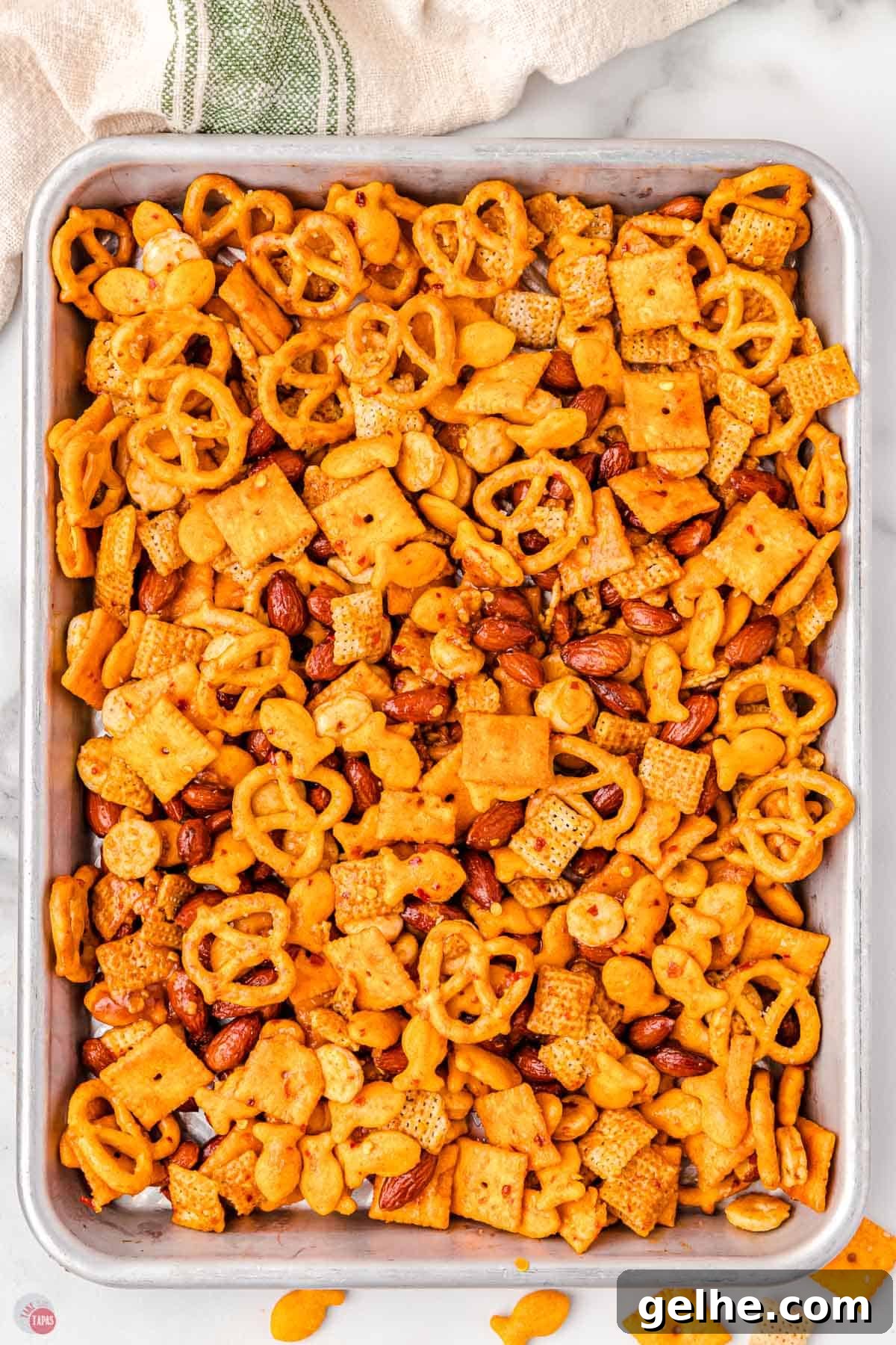 chex mix in an ungreased large roasting pan