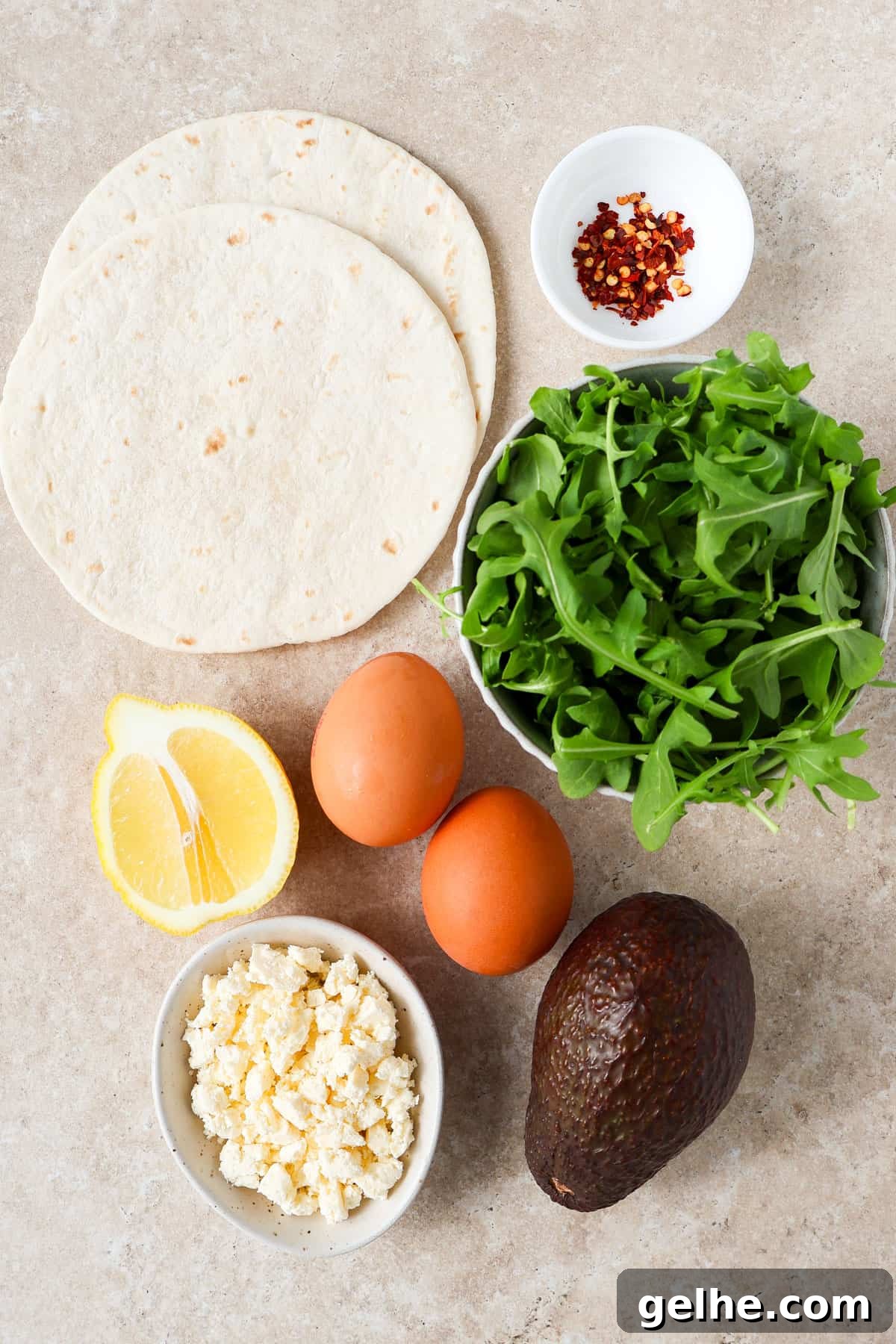 Ingredients shown to make the crispy feta fried egg tortilla.