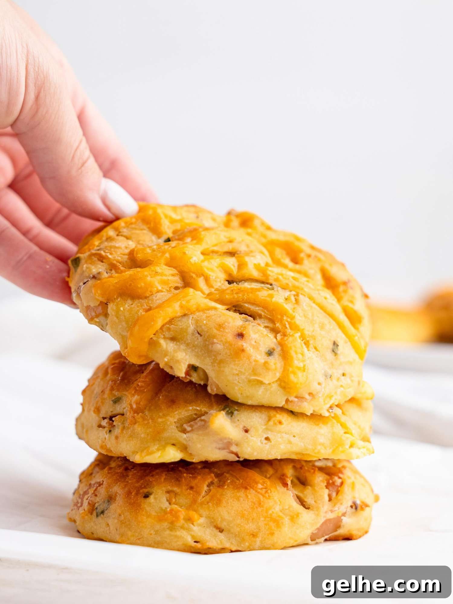 High-Protein Biscuits Without Butter – Fluffy, Low-Fat Recipe 16 Three protein biscuits stacked on top of each other.