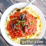 Authentic Pasta Puttanesca Recipe: Tangy Olive & Tomato Sauce 6 Pasta Puttanesca - budget friendly, quick and easy recipe for busy weeknights