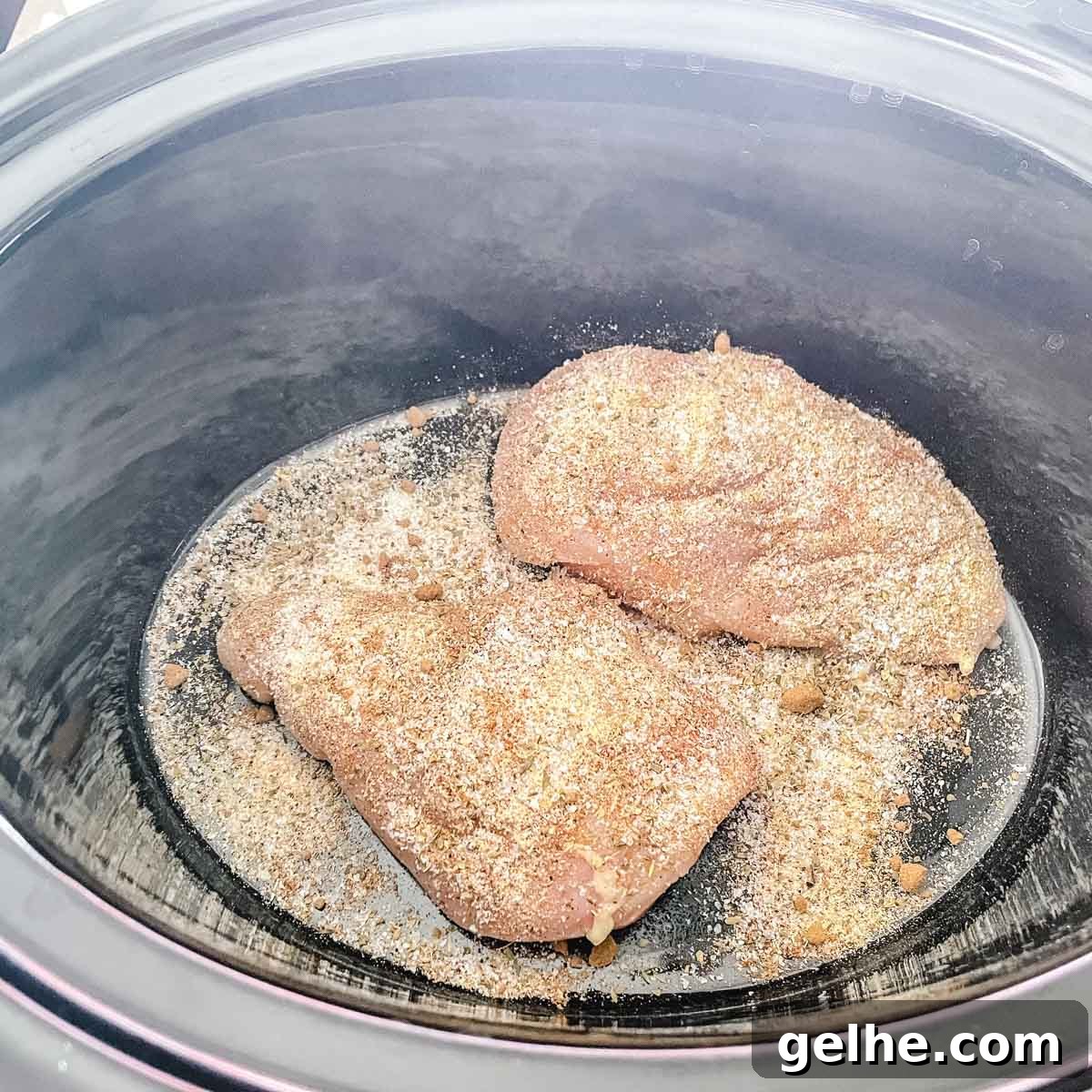 Slow Cooker Shredded Chicken Enchiladas Recipe 6 Spices are added to the chicken.