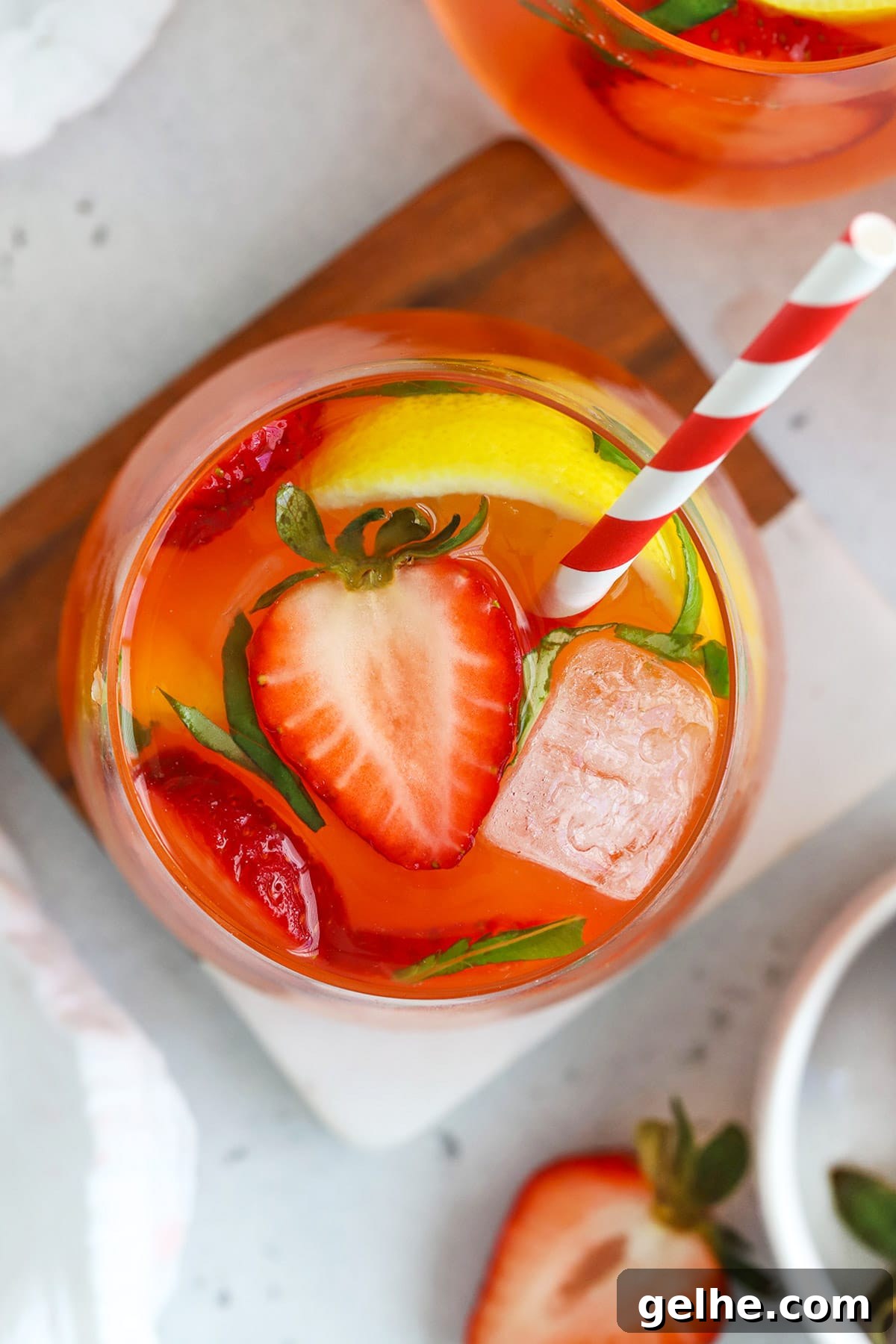 Overhead view of a glass of homemade strawberry basil lemonade