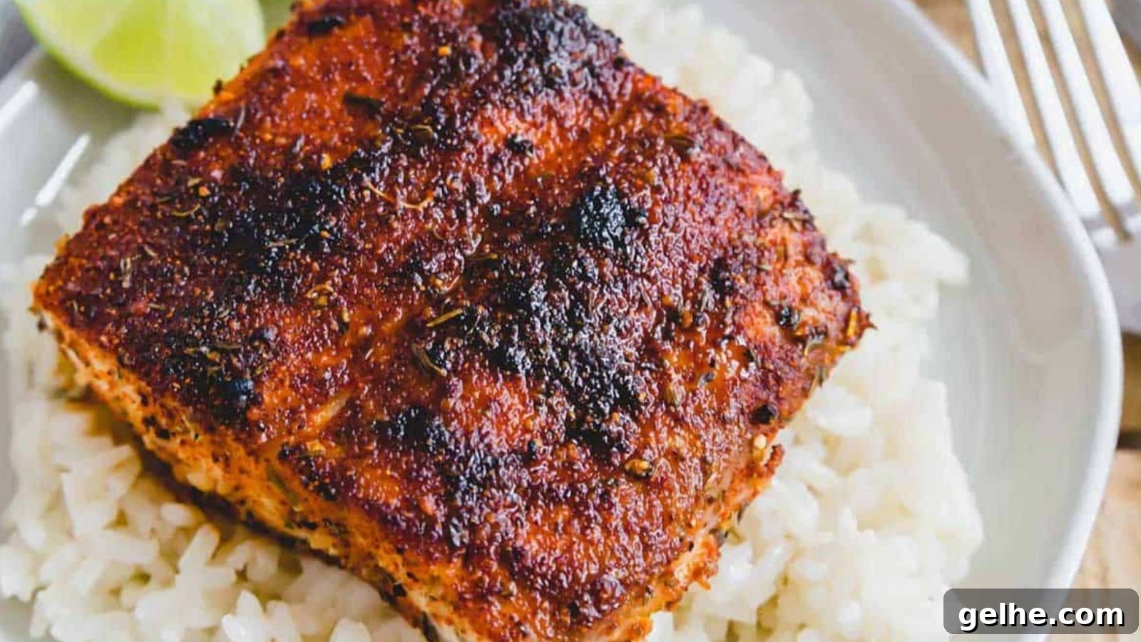 Blackened mahi mahi over white rice.
