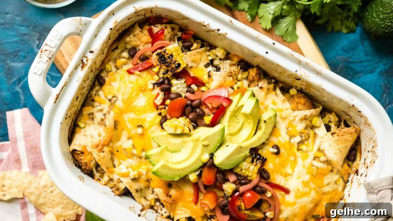 Halibut enchiladas smoked with creamy filling and melted cheese on top.