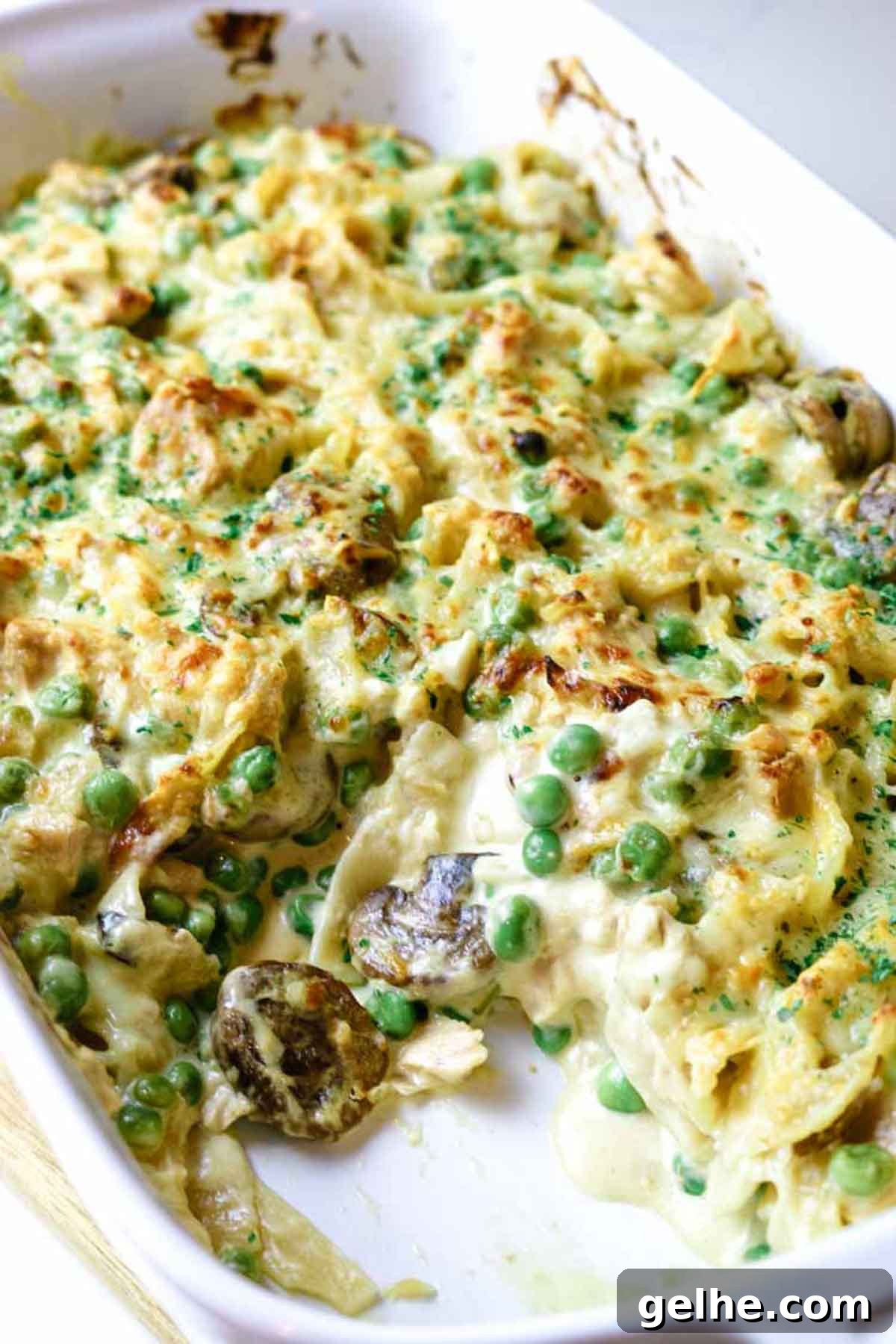 tuna noodle casserole with serving scooped out.