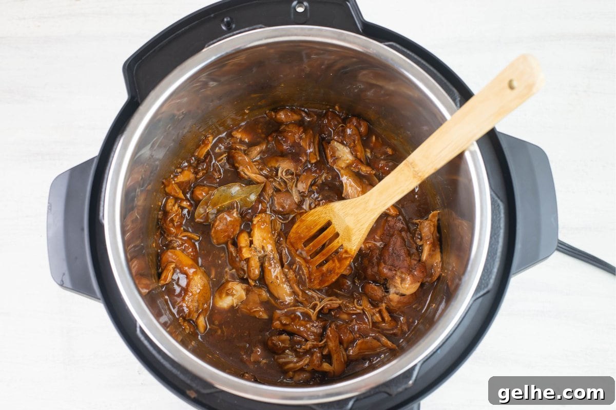 Cooked chicken adobo in the thickened adobo sauce.