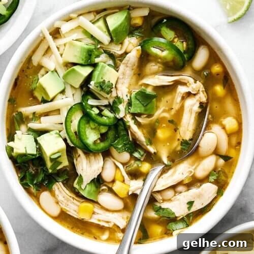 A white bowl of white chicken chili.
