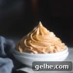 cropped image of the frosting piped on white bowl to fit the recipe card image
