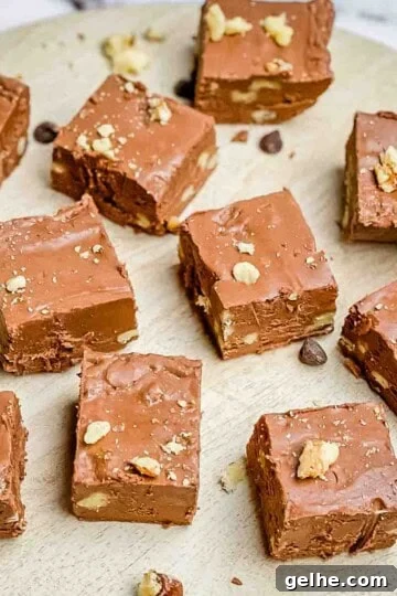 Christmas fudge sliced in squares and placed on a serving tray.