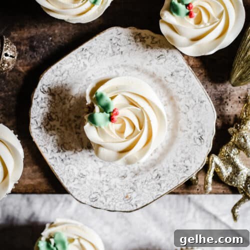 Mince Pie Cupcakes from above surrounded by Christmas decorations