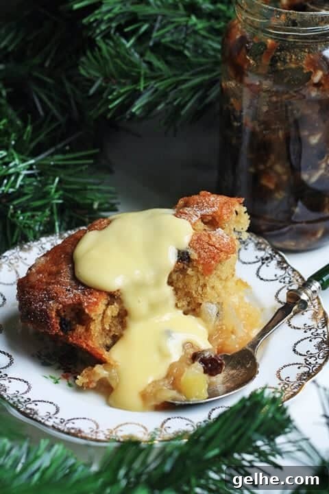 Plate of bramley apple mincemeat pudding with custard