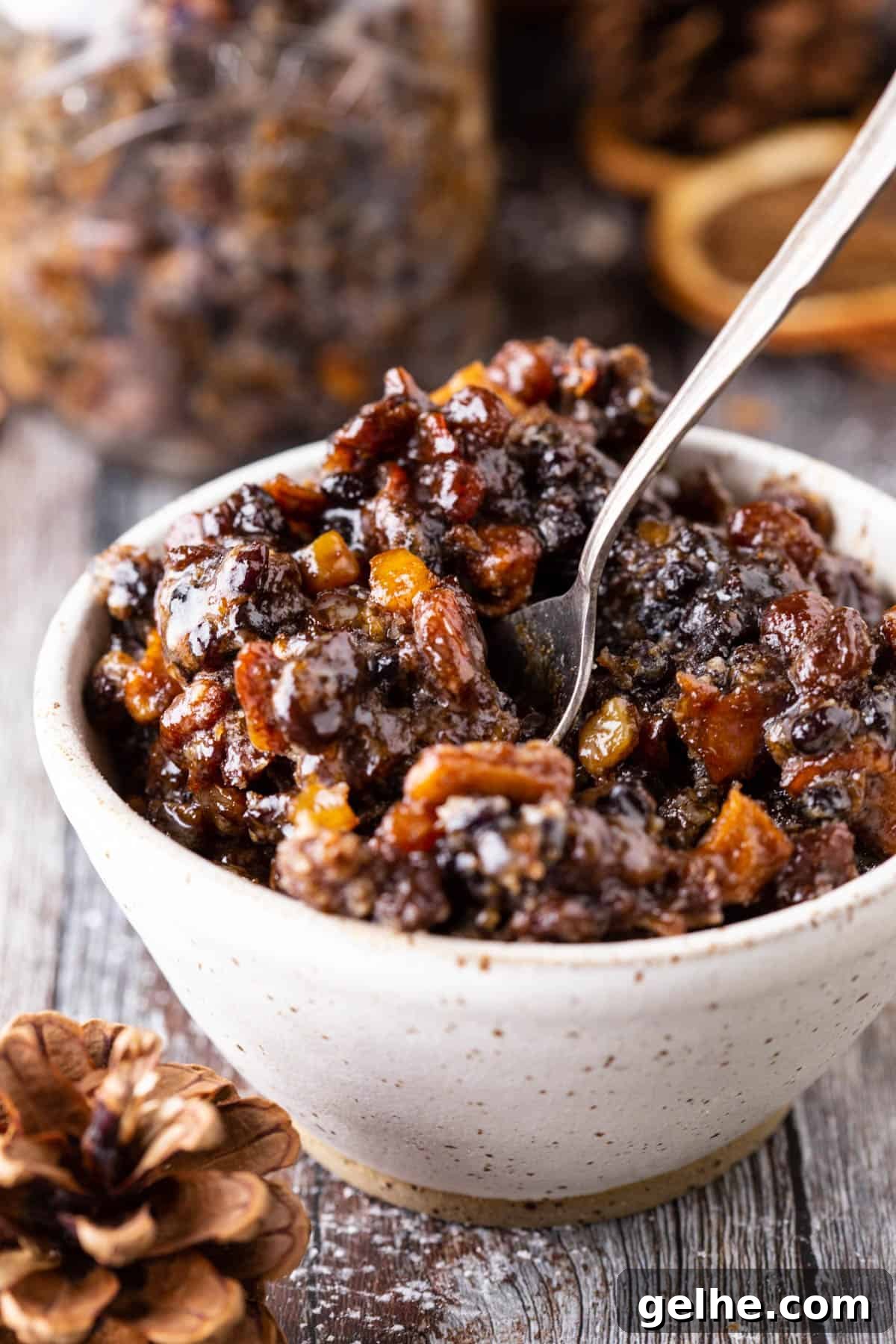 Gluten-Free Suet Mincemeat Recipe for Classic Pies 3 mincemeat in a bowl with the plump fruits glistening.